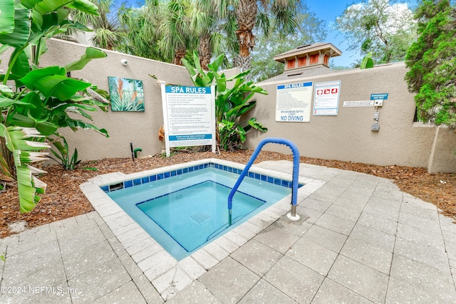 12700 Bartram Park Blvd Unit 124, Jacksonville, FL 32258 - view of swimming pool featuring a hot tub