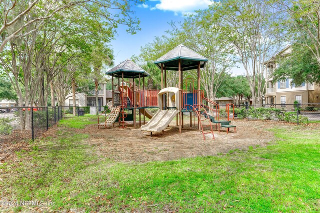 view of jungle gym featuring a yard