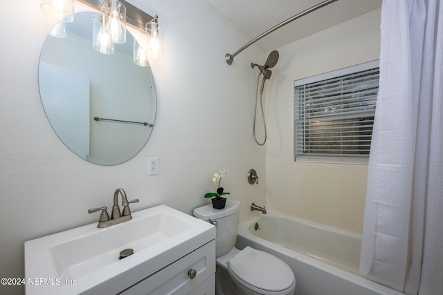 full bathroom featuring vanity, toilet, a textured ceiling, and shower / bath combo