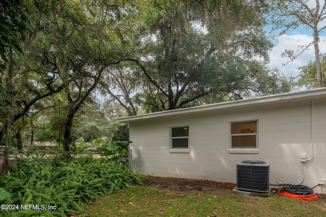 view of home's exterior with central air condition unit