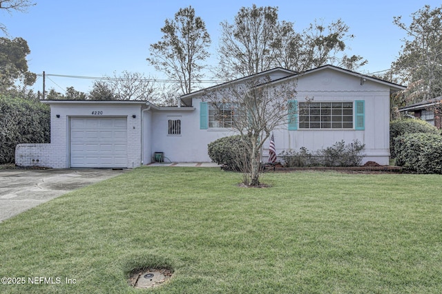 ranch-style home with a garage, driveway, brick siding, and a front yard