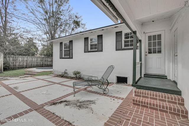 view of patio / terrace with fence