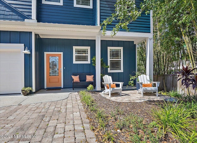 entrance to property featuring a garage