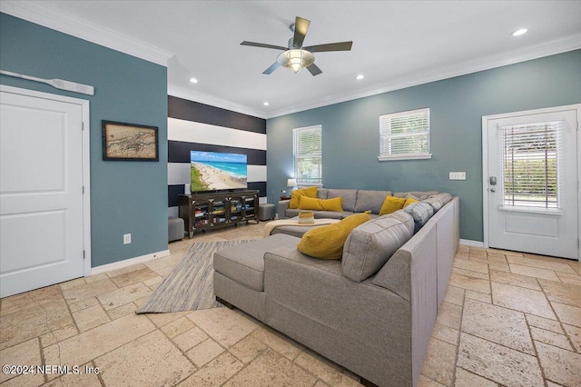 living room featuring ceiling fan and ornamental molding