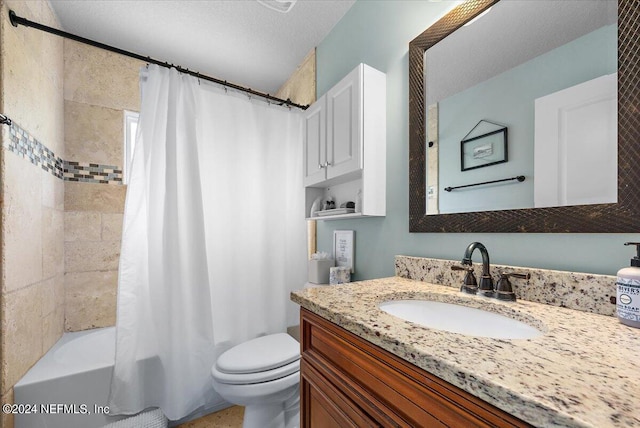 full bathroom with vanity, a textured ceiling, toilet, and shower / bathtub combination with curtain