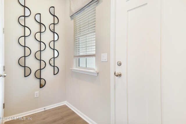 doorway to outside featuring hardwood / wood-style floors