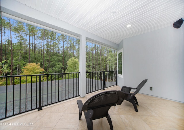 sunroom / solarium with wooden ceiling