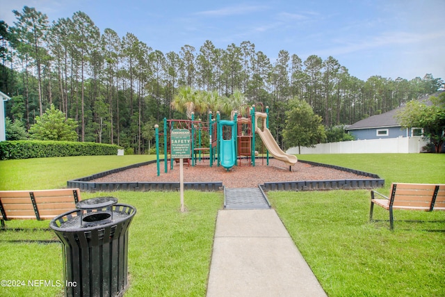 view of play area with a yard