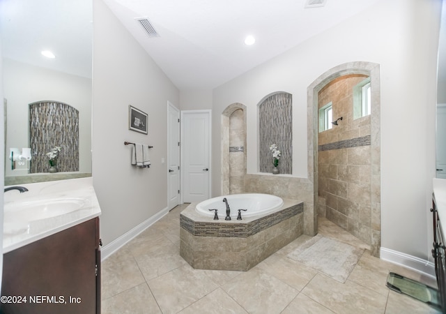 bathroom with vanity, tile patterned flooring, and separate shower and tub