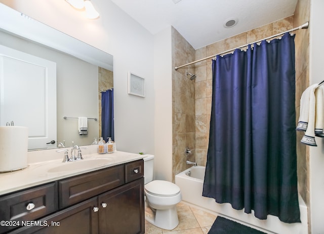 full bathroom with shower / bath combination with curtain, vanity, toilet, and tile patterned floors