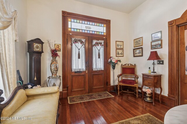 foyer entrance with hardwood / wood-style flooring