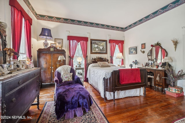 bedroom featuring hardwood / wood-style floors