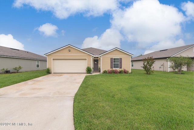 ranch-style home with a garage and a front lawn