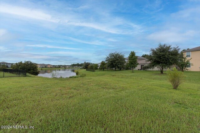 view of yard with a water view