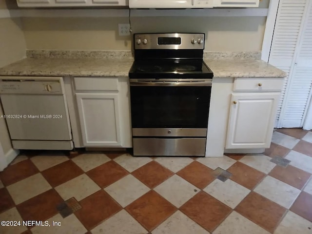 kitchen with stainless steel range with electric stovetop, light stone counters, white cabinetry, and dishwasher