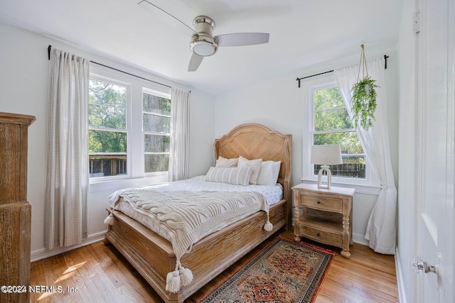 bedroom featuring ceiling fan and light wood-type flooring