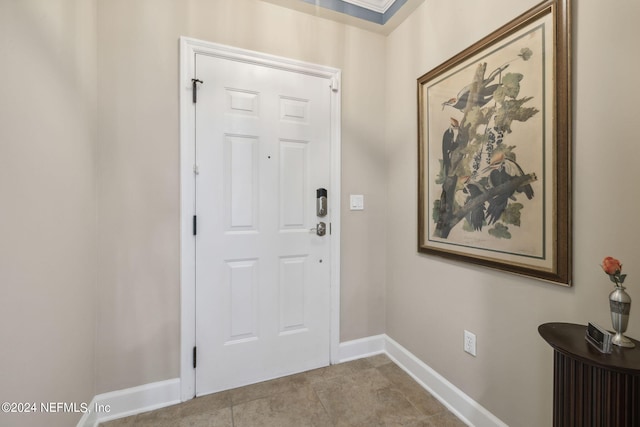 view of tiled entrance foyer