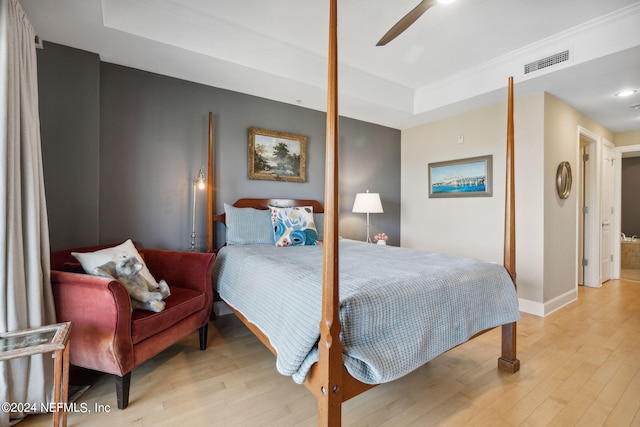 bedroom featuring ceiling fan and light wood-type flooring