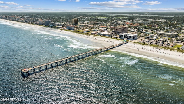 aerial view with a view of the beach and a water view