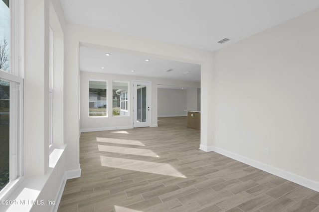 empty room with light wood-type flooring