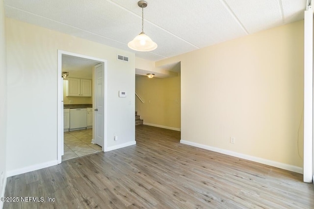 empty room with light wood-type flooring