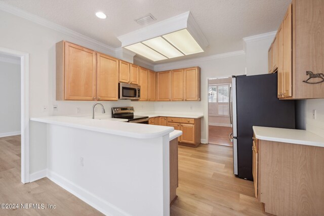 kitchen featuring light brown cabinetry, appliances with stainless steel finishes, light wood-type flooring, and crown molding