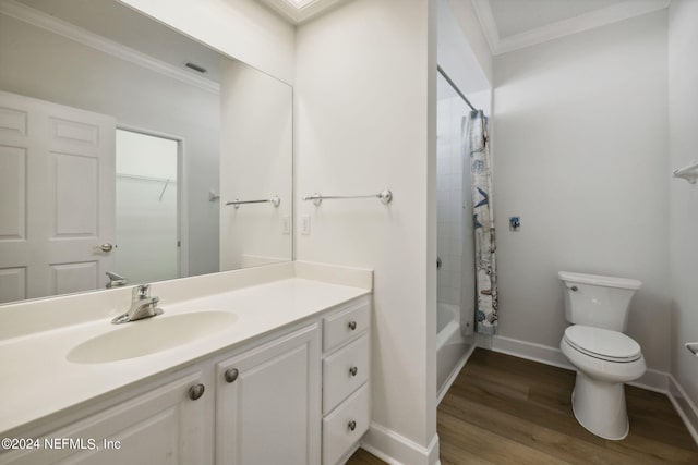 full bathroom featuring shower / tub combo, vanity, crown molding, toilet, and hardwood / wood-style floors