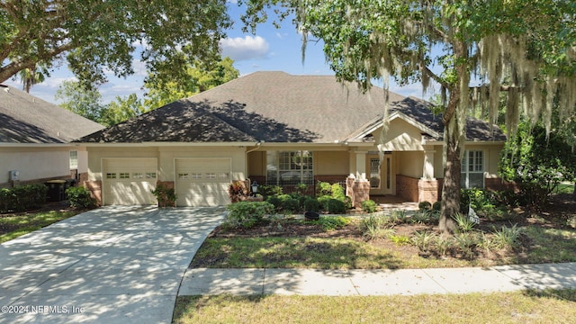 view of front of home with a garage