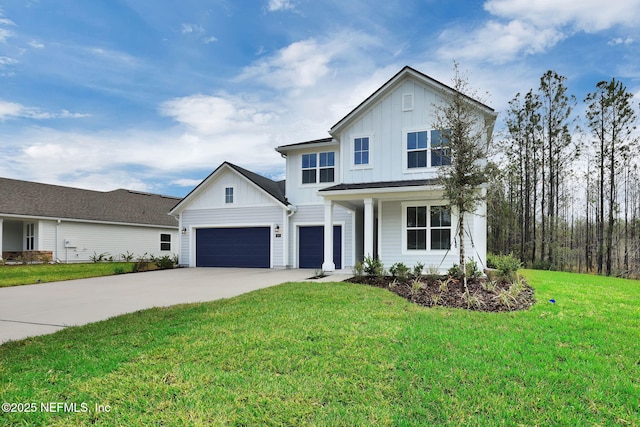 view of front of house with board and batten siding, concrete driveway, covered porch, and a front lawn