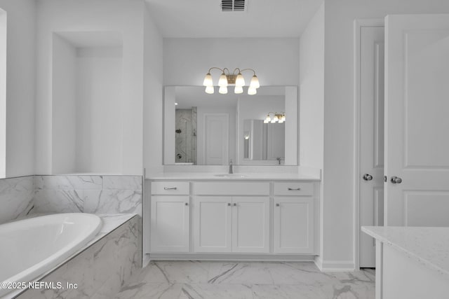 full bath with marble finish floor, a marble finish shower, visible vents, vanity, and a bath