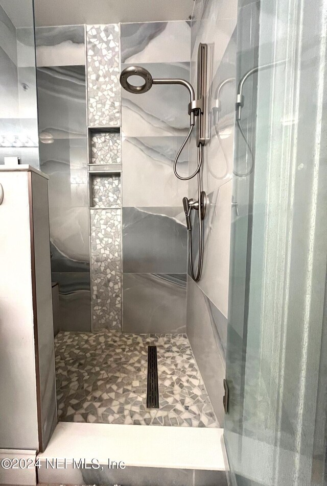 bathroom with walk in shower