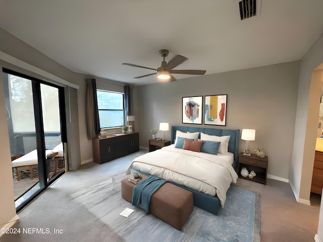 bedroom with light carpet, access to exterior, and ceiling fan