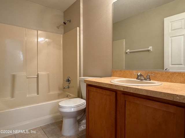 full bathroom featuring shower / bathing tub combination, tile patterned flooring, vanity, and toilet