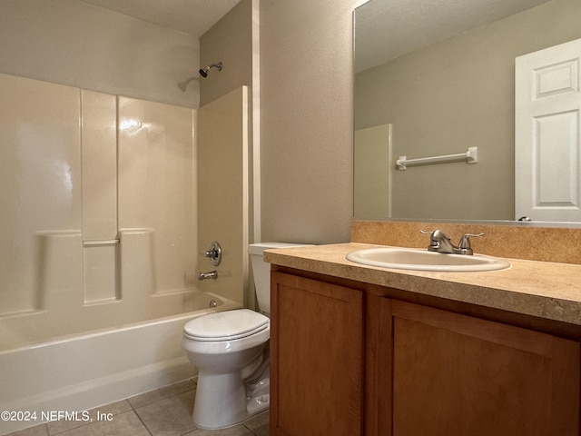 bathroom featuring  shower combination, toilet, tile patterned flooring, and vanity