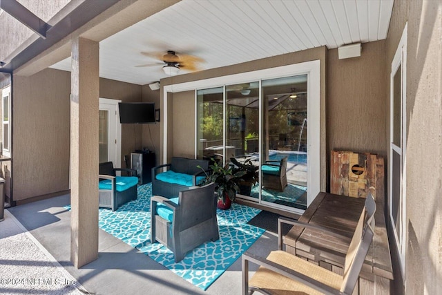 view of patio / terrace featuring ceiling fan and outdoor lounge area