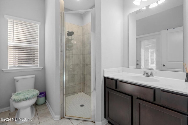 bathroom with toilet, a stall shower, tile patterned flooring, and vanity