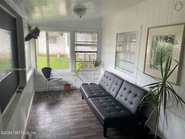 sunroom / solarium featuring lofted ceiling