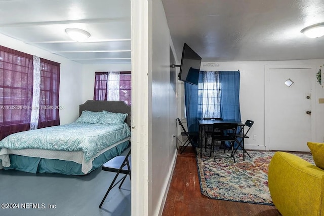 bedroom featuring hardwood / wood-style floors