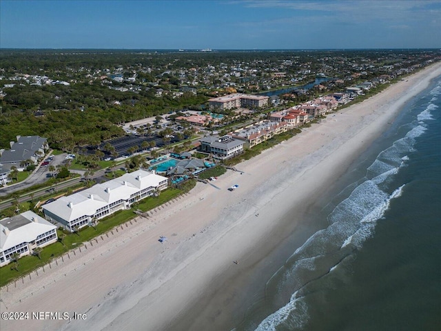 aerial view featuring a beach view and a water view