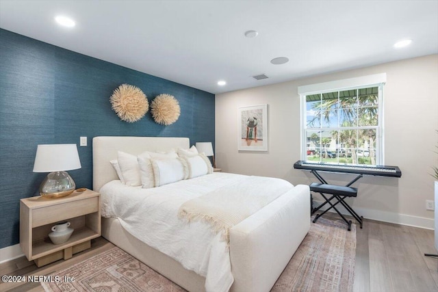 bedroom featuring hardwood / wood-style flooring