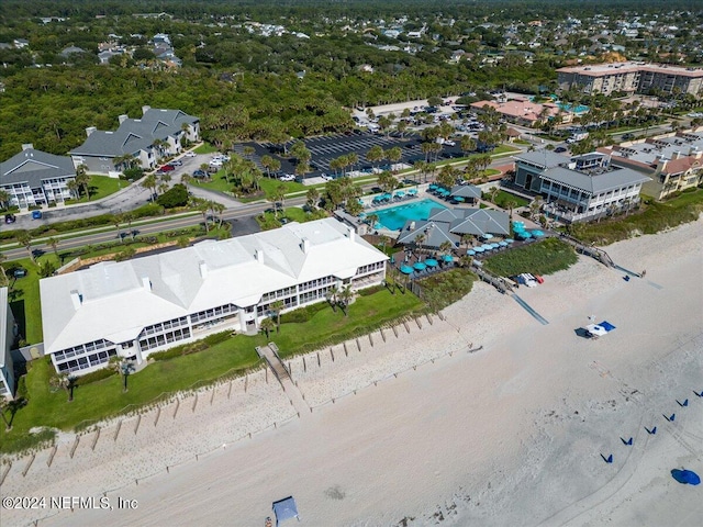 drone / aerial view with a view of the beach and a water view