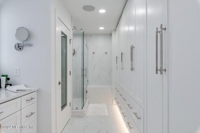 bathroom with vanity and an enclosed shower