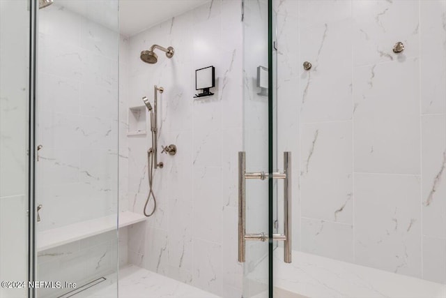 bathroom featuring walk in shower