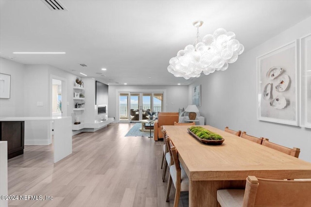 dining space featuring light hardwood / wood-style floors