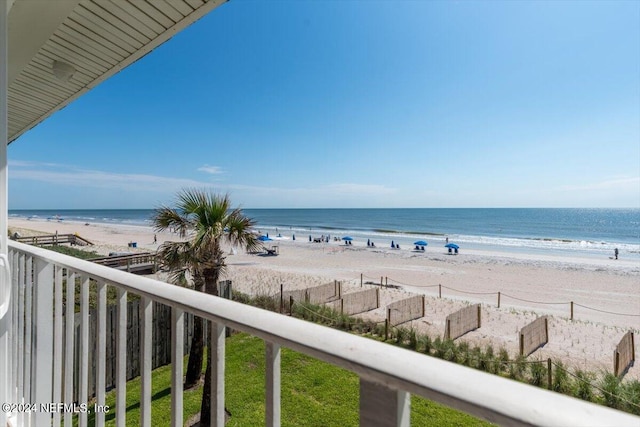 view of water feature with a beach view