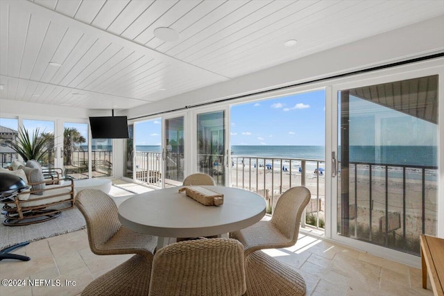 sunroom / solarium with wooden ceiling