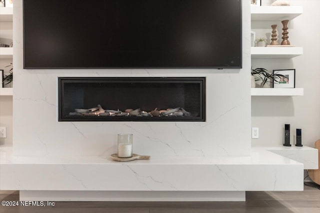 interior details featuring hardwood / wood-style flooring