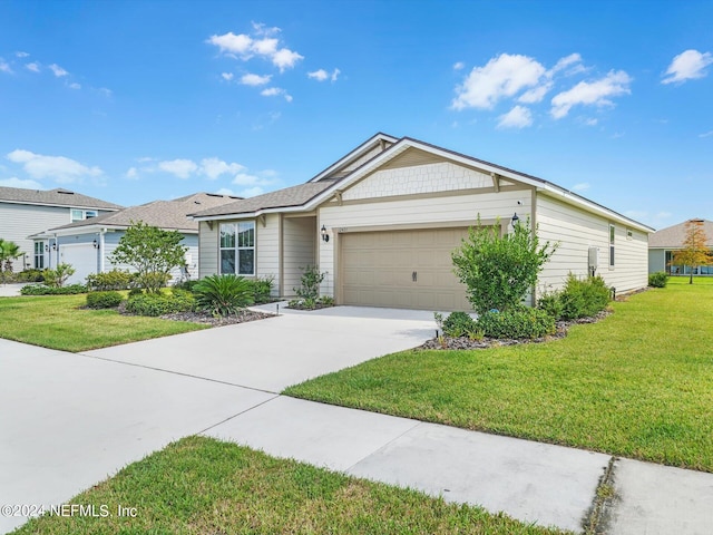 ranch-style home with a garage and a front yard