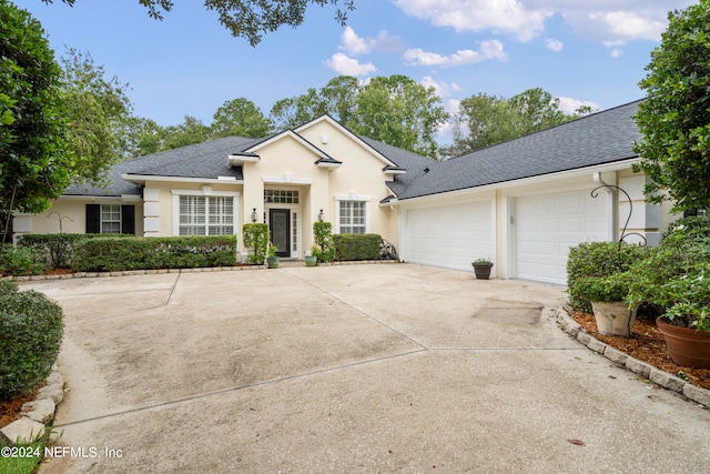 view of front of home featuring a garage