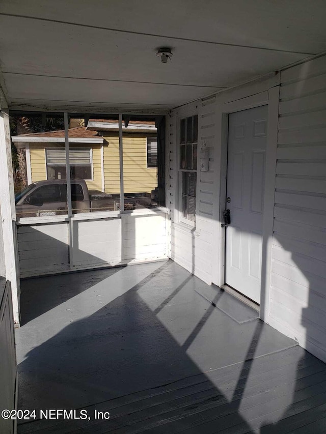 view of unfurnished sunroom